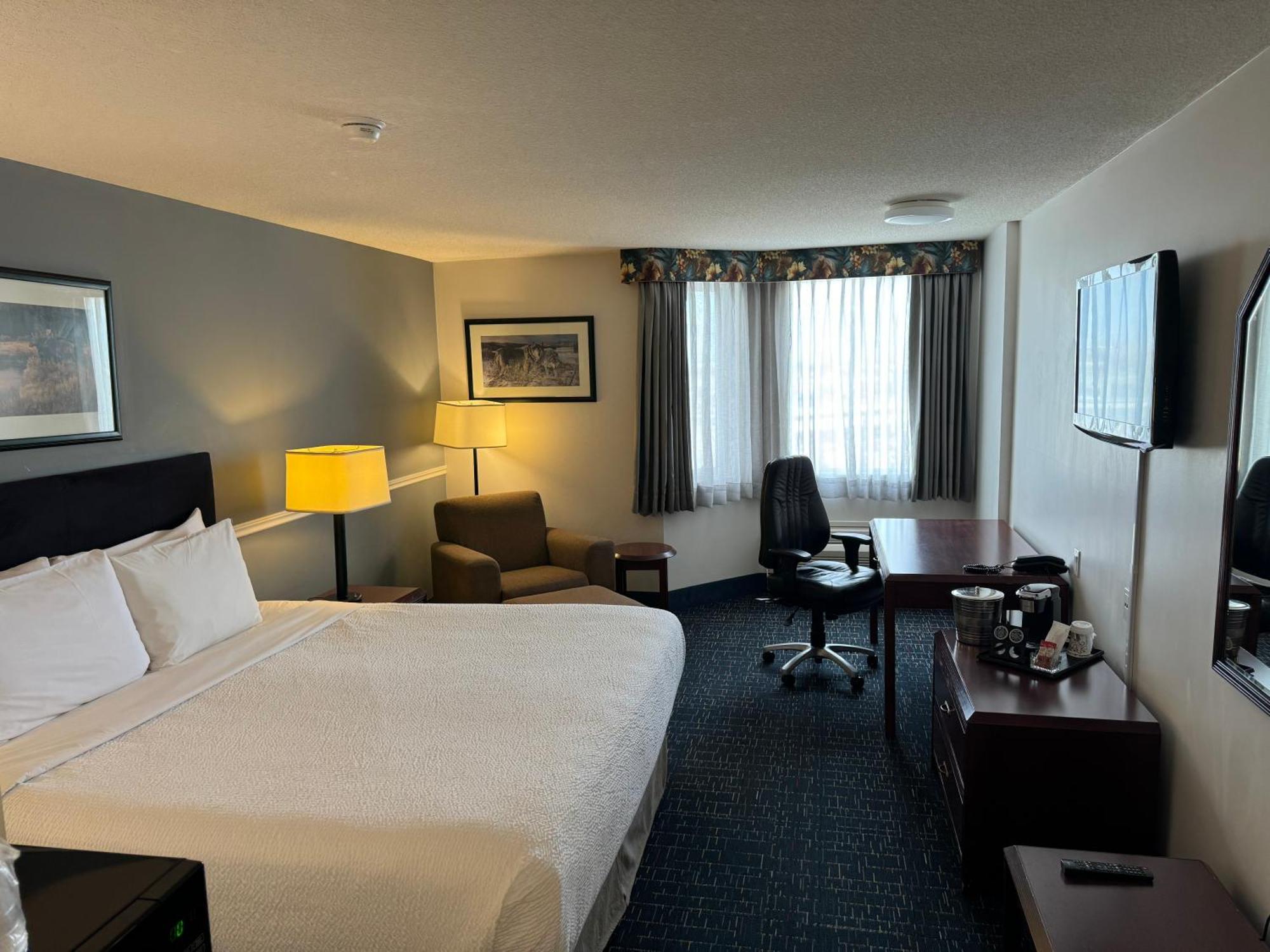 Hotel Divya Sutra Plaza And Conference Centre Calgary Airport Esterno foto