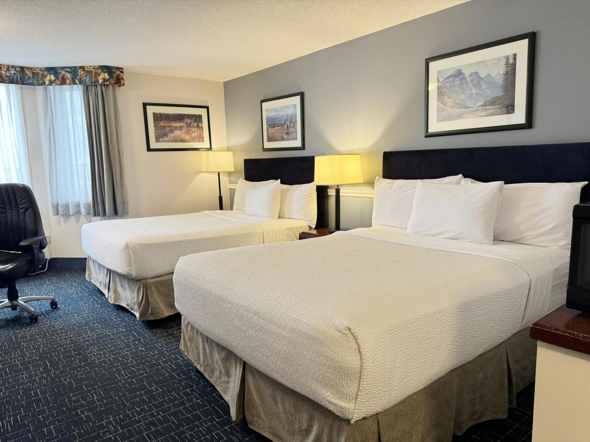 Hotel Divya Sutra Plaza And Conference Centre Calgary Airport Esterno foto